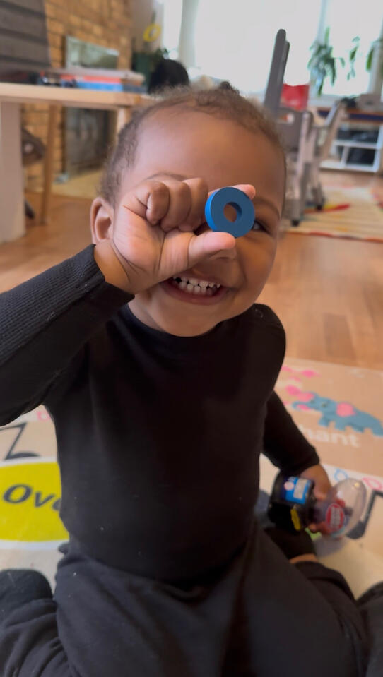 Child participating in a hands-on learning activity at Advanced Childcare Services LLC